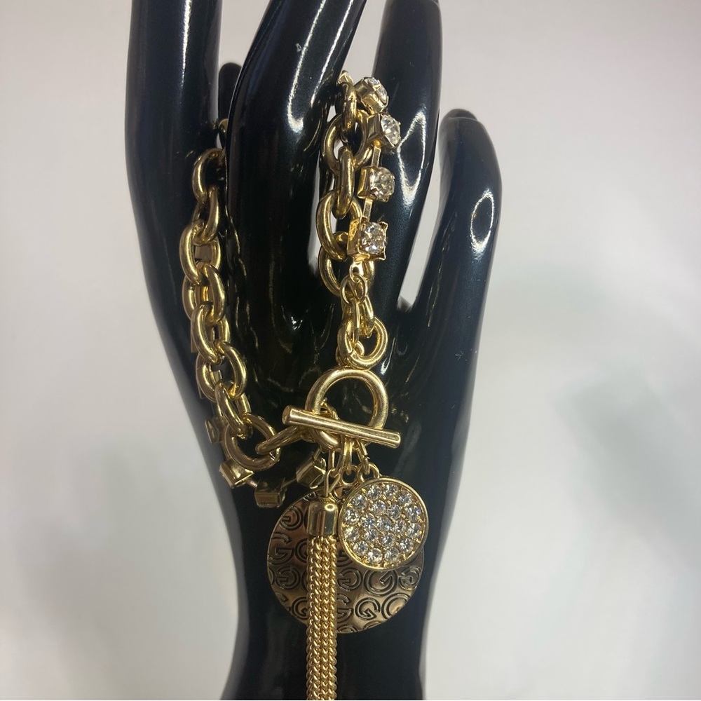 GOLD TONE TOGGLE CLOSURE CHARM BRACELET